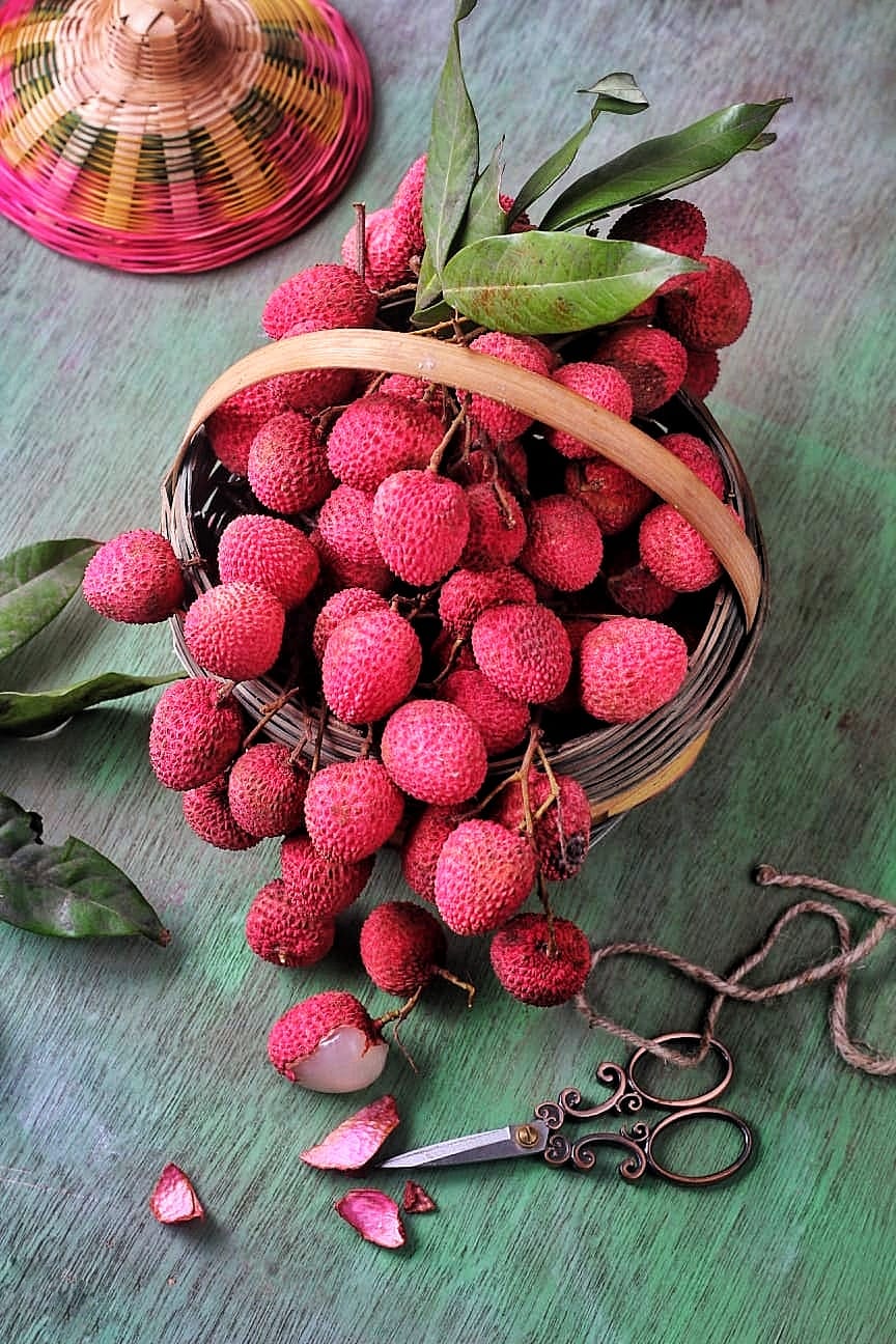 Lychee fruit placed in a basket